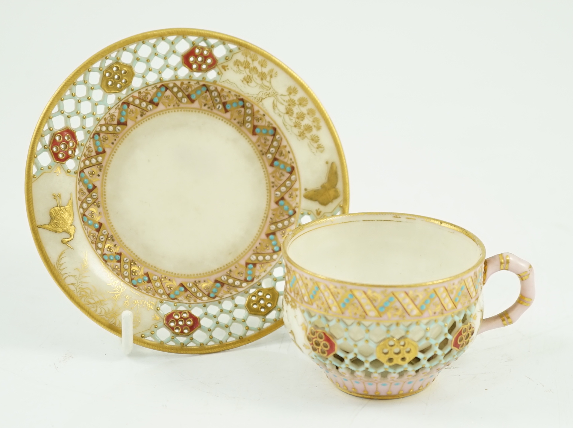 A Royal Worcester reticulated miniature cabinet cup and saucer, late 19th century